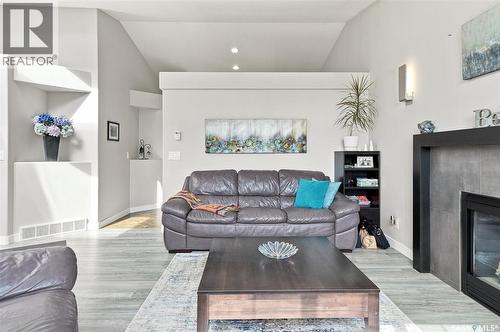 547 Bayview Terrace, Saskatoon, SK - Indoor Photo Showing Living Room With Fireplace