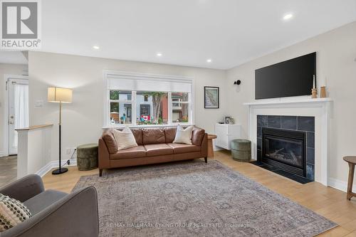 20 Belgrave Road, Ottawa, ON - Indoor Photo Showing Living Room With Fireplace