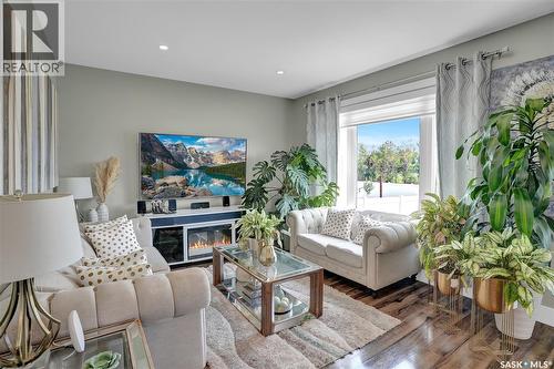 1049 Maplewood Drive, Moose Jaw, SK - Indoor Photo Showing Living Room With Fireplace