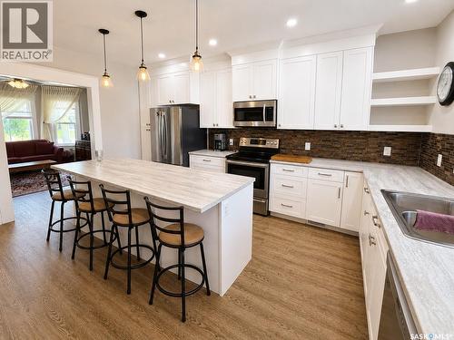 205 3Rd Avenue, Harris, SK - Indoor Photo Showing Kitchen With Double Sink With Upgraded Kitchen