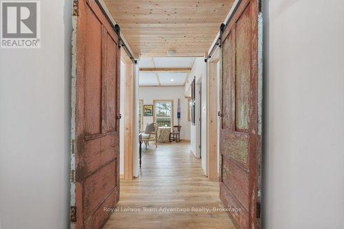 Bunkie hall - 10 3Rd Concession Road, Carling, ON - Indoor Photo Showing Other Room
