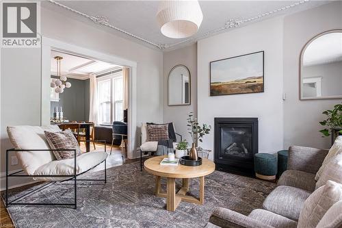 435 Dundurn Street S, Hamilton, ON - Indoor Photo Showing Living Room With Fireplace
