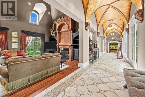 Foyer with Cathedral Ceiling & Hand-Painted Mural - 10090 Pineview Trail, Milton, ON - Indoor With Fireplace