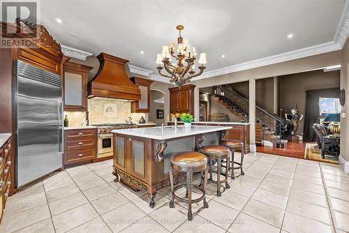The Gourmet Kitchen Offers a Dedicated Servery - 10090 Pineview Trail, Milton, ON - Indoor