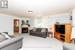 Spacious living room with gas fireplace - 