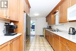Galley kitchen with plenty of storage - 
