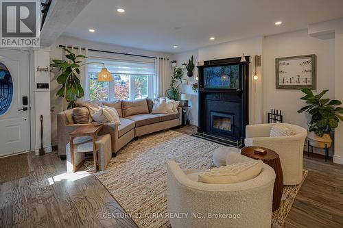 36 Miles Road, Toronto, ON - Indoor Photo Showing Living Room With Fireplace