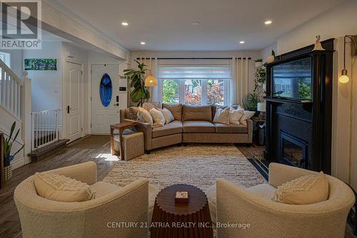 36 Miles Road, Toronto, ON - Indoor Photo Showing Living Room With Fireplace