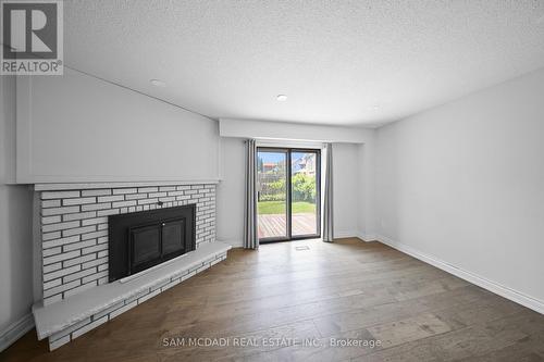 3949 Teakwood Drive, Mississauga, ON - Indoor Photo Showing Living Room With Fireplace