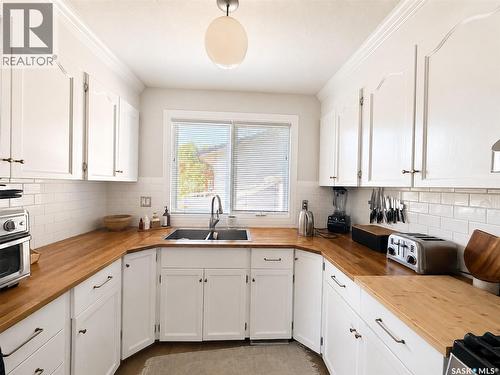 386 4Th Street E, Shaunavon, SK - Indoor Photo Showing Kitchen With Double Sink