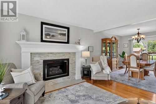 1190 Nuforest Drive, Selwyn, ON - Indoor Photo Showing Living Room With Fireplace