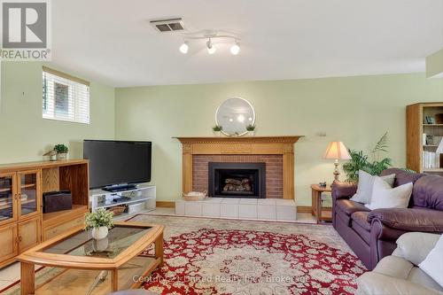 1190 Nuforest Drive, Selwyn, ON - Indoor Photo Showing Living Room With Fireplace