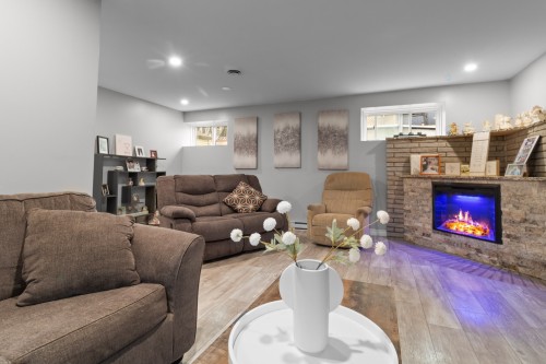 Family Room - 236 23E Avenue, Deux-Montagnes, QC - Indoor Photo Showing Living Room With Fireplace
