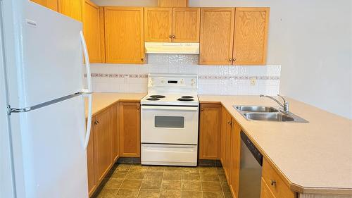 18A Wolf Crescent, Windermere, BC - Indoor Photo Showing Kitchen With Double Sink