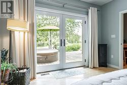 Primary Bedroom With Doors To Deck - 