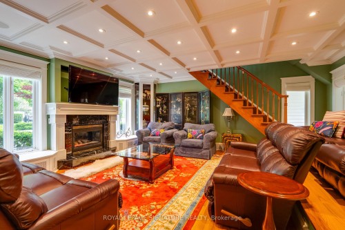 220 Greyabbey Trail, Toronto, ON - Indoor Photo Showing Living Room With Fireplace
