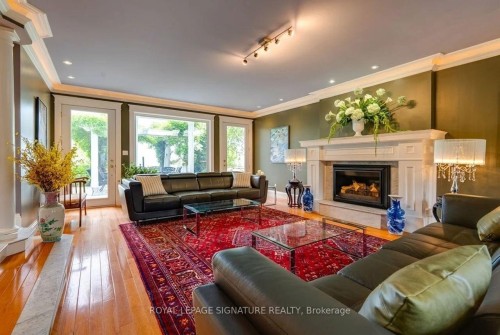 220 Greyabbey Trail, Toronto, ON - Indoor Photo Showing Living Room With Fireplace