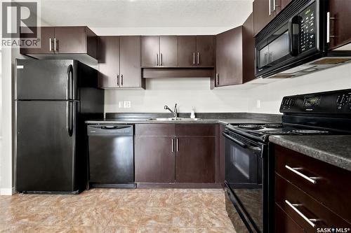 80 5533 Blake Crescent, Regina, SK - Indoor Photo Showing Kitchen With Double Sink