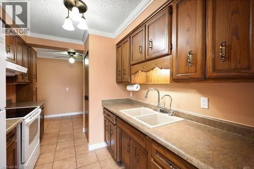 400 Champlain Boulevard Unit# 406, Cambridge, ON - Indoor Photo Showing Kitchen With Double Sink