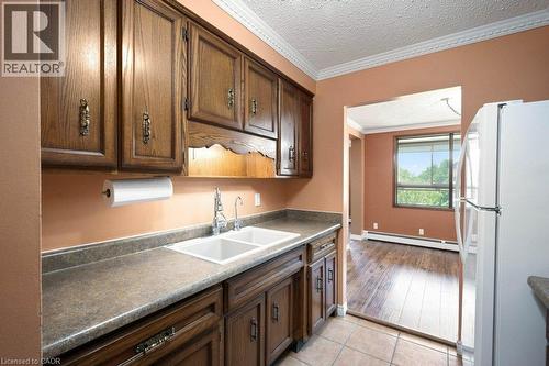 400 Champlain Boulevard Unit# 406, Cambridge, ON - Indoor Photo Showing Kitchen With Double Sink