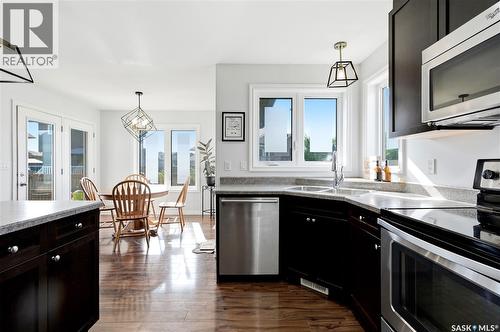 668 Lehrer Crescent, Saskatoon, SK - Indoor Photo Showing Kitchen With Double Sink
