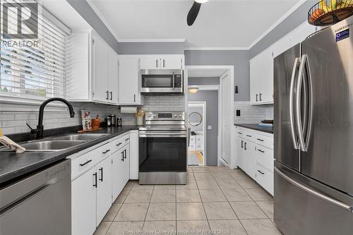 1749 Shawnee, Tecumseh, ON - Indoor Photo Showing Kitchen With Double Sink