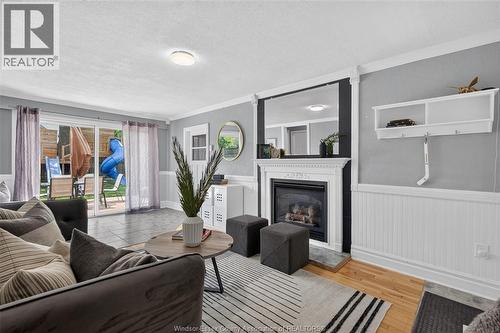 1749 Shawnee, Tecumseh, ON - Indoor Photo Showing Living Room With Fireplace