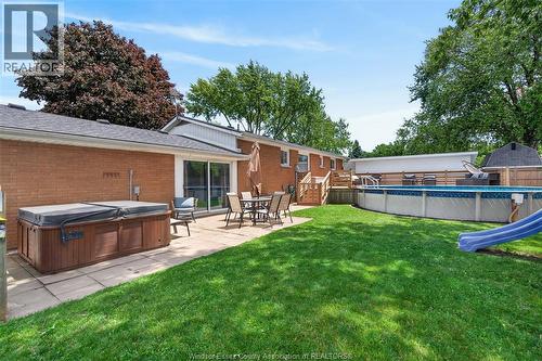 1749 Shawnee, Tecumseh, ON - Outdoor With Above Ground Pool With Backyard