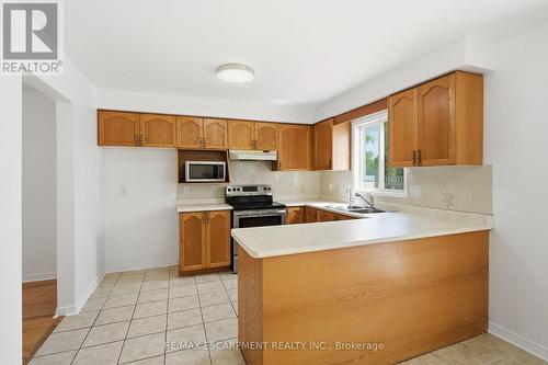 448 Stone Church Road E, Hamilton, ON - Indoor Photo Showing Kitchen With Double Sink
