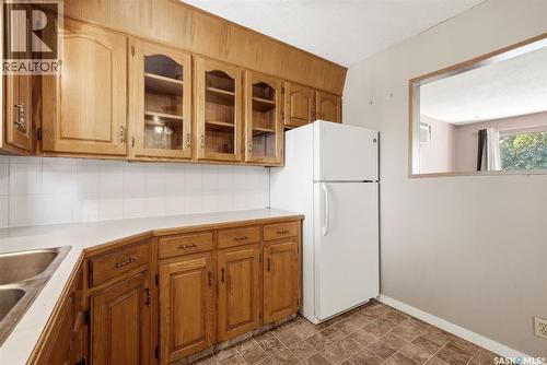 158 Read Avenue, Regina, SK - Indoor Photo Showing Kitchen With Double Sink