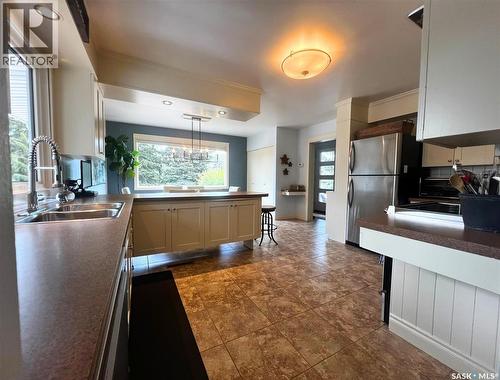 1183 George Street E, Swift Current, SK - Indoor Photo Showing Kitchen With Double Sink