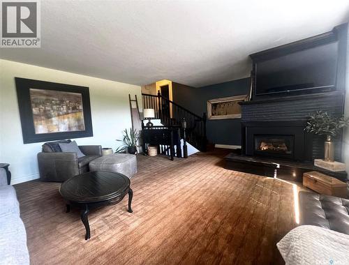 1183 George Street E, Swift Current, SK - Indoor Photo Showing Living Room With Fireplace