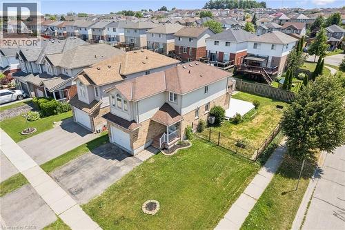 Two-story residential property featuring a brick and siding exterior - 71 Peach Blossom Crescent, Kitchener, ON - Outdoor