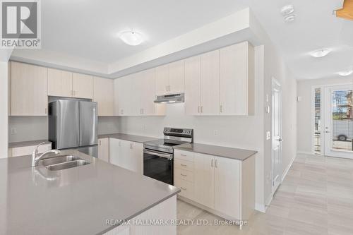16 Crossmore Crescent, Cambridge, ON - Indoor Photo Showing Kitchen With Stainless Steel Kitchen With Double Sink With Upgraded Kitchen