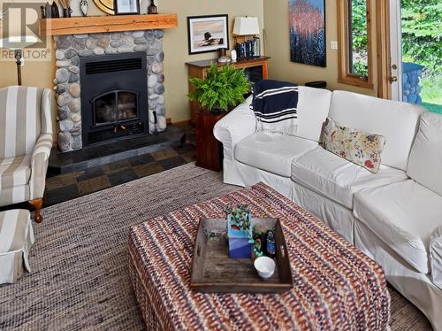 123 Canfield Rd, Kenora, ON - Indoor Photo Showing Living Room With Fireplace