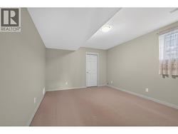 Fourth bedroom on the lower level with a walk-in closet - 