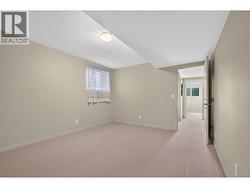 Fourth bedroom on the lower level with a walk-in closet - 