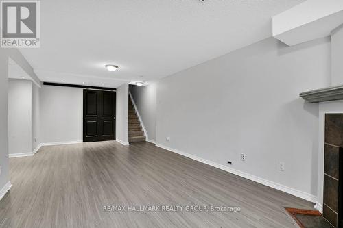 144 Trail Side Circle, Ottawa, ON - Indoor Photo Showing Other Room With Fireplace