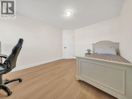 Room featuring light wood-finish flooring and white baseboards - 39 Baintree Way, Cambridge, ON - Indoor