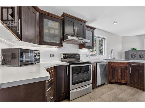 Kitchen with updates throughout - 602 Glenmeadows Road, Kelowna, BC - Indoor Photo Showing Kitchen