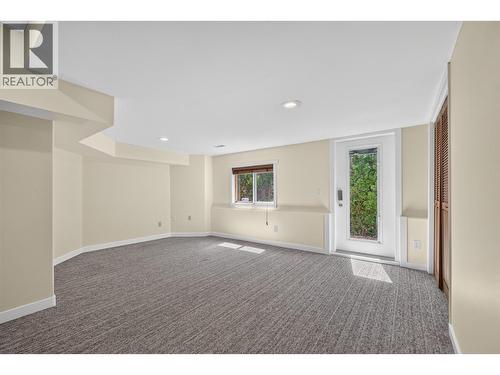 5th bedroom/ Recreation room with separate entrance - 602 Glenmeadows Road, Kelowna, BC - Indoor Photo Showing Other Room
