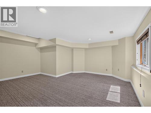5th bedroom/ Recreation room with separate entrance - 602 Glenmeadows Road, Kelowna, BC - Indoor Photo Showing Other Room