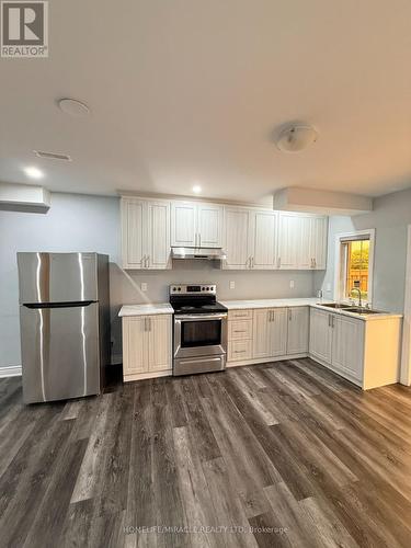 21 Valleyscape Trail, Caledon, ON - Indoor Photo Showing Kitchen With Double Sink