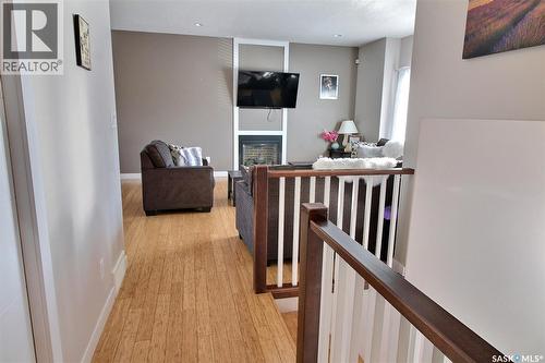 857 Madsen Place, Prince Albert, SK - Indoor Photo Showing Other Room With Fireplace