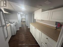AI -Staged Basement Kitchen - 
