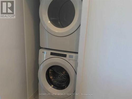 1416 - 30 Shore Breeze Drive, Toronto, ON - Indoor Photo Showing Laundry Room