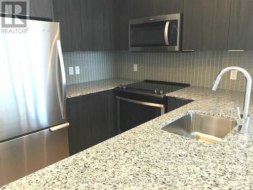 1416 - 30 Shore Breeze Drive, Toronto, ON - Indoor Photo Showing Kitchen With Stainless Steel Kitchen With Upgraded Kitchen