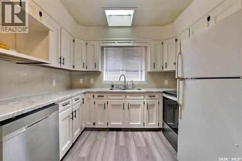 122 Edenwold Crescent, Regina, SK - Indoor Photo Showing Kitchen With Double Sink