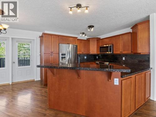 4 Ruby Lane, Whitehorse, YT - Indoor Photo Showing Kitchen With Stainless Steel Kitchen