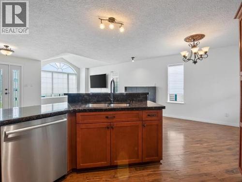 4 Ruby Lane, Whitehorse, YT - Indoor Photo Showing Kitchen With Double Sink